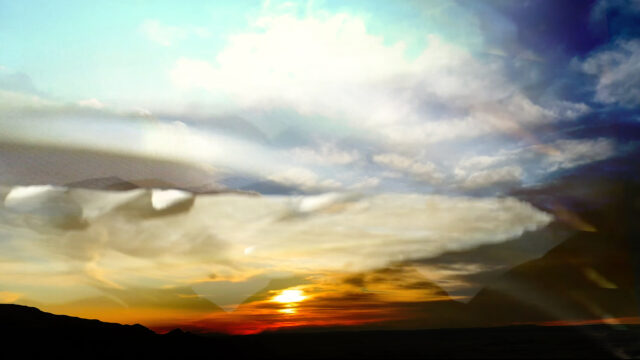 Bright saturated sunset with fluffy clouds